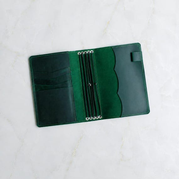 2,645 favorites don't lie — this pocketed, monogrammed leather notebook cover has clearly hit a sweet spot of craft quality and practical design that keeps buyers coming back.