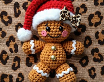 Cute template for T-shirt Design. Crocheted Gingerbread man with dark leopard pattern background and leopard print rimmed Santa hat.