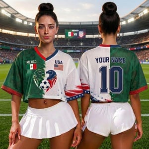 May include: A split-design jersey featuring a green side with the Mexico flag and a white side with the USA flag, a central soccer ball graphic, and the text "YOUR NAME" with the number "10" on the back, paired with a white pleated skirt.