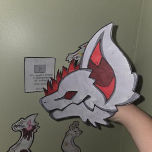 Full Sized and Miniature Dragon Puppet