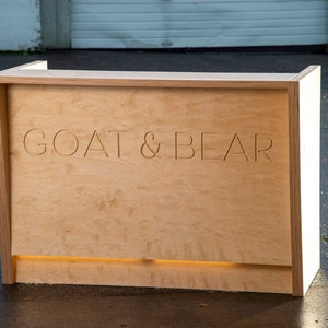 Hybrid - Baltic Birch Reception Desk with Carved Logo and FREE SHIPPING. (*Desk Shown with optional return)