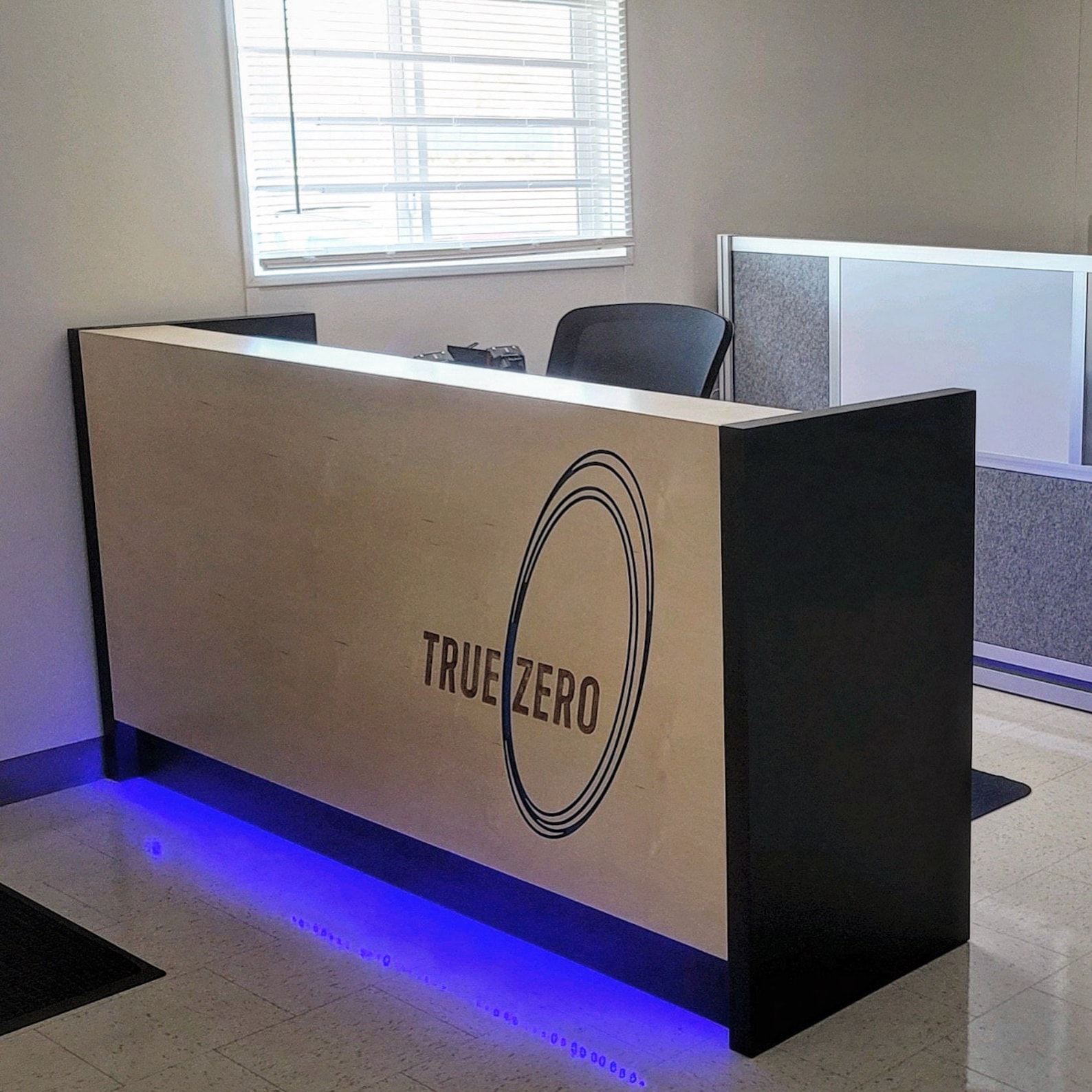 Basic Birch Plywood Reception Desk With Carved Logo Split Finish Colored Light Toe Kick and FREE