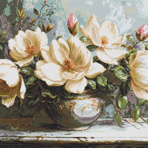May include: A digital art piece of a floral arrangement. Cream-colored magnolia blossoms with orange centers and pink buds are arranged in a decorative vase. The background has a soft, textured appearance with muted tones of blue, green, and purple.