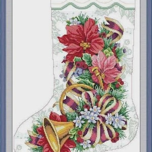May include: Cross-stitch Christmas stocking with a festive design. The stocking is filled with red poinsettias, pink flowers, gold bells, and striped ribbons. The background features musical notes and a decorative border, all framed in blue.