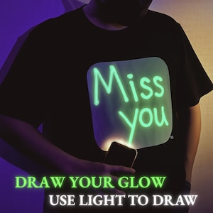 Glow in the Dark T-Shirt | Write or Draw with Light | Personalized Message Tee for Men | Fun, Reusable, Unique Gift for Parties & Birthdays