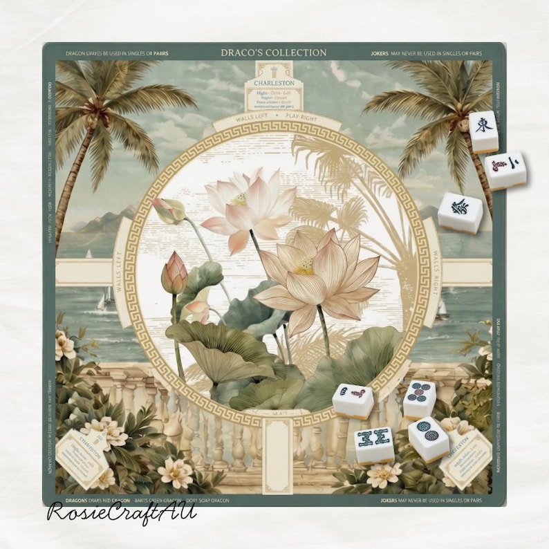 May include: A square Mahjong game mat featuring a central illustration of pink lotus flowers and green leaves framed by a gold circular border. The background depicts a coastal scene with palm trees and a stone balustrade. Several white Mahjong tiles are scattered on the surface, and the text "DRACO'S COLLECTION" is printed at the top.