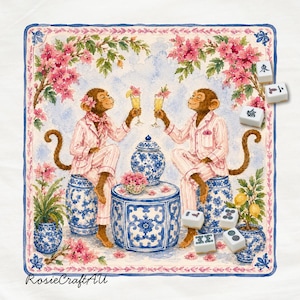 May include: A square decorative print featuring two monkeys in pink striped pajamas sitting on blue and white ceramic garden stools, toasting with champagne flutes. The scene includes a blue and white ginger jar, mahjong tiles, and pink flowers.