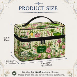 May include: A rectangular storage case with a golf-themed print featuring pink flowers, palm trees, and golf carts. It has a black handle and zipper. Dimensions are 6.3 inches high, 6.7 inches deep, and 9.1 inches long. The text MASTERS is visible.