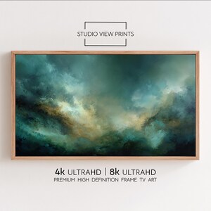 May include: A framed abstract art print with a wooden frame. The artwork features a blend of teal, gold, and dark green hues, creating a cloudy or atmospheric effect. The text "STUDIO VIEW PRINTS" is at the top, and "4K ULTRAHD | 8K ULTRAHD" is at the bottom.