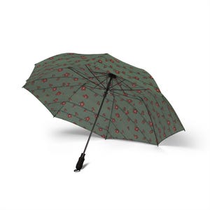 May include: An open, green umbrella with a repeating pattern of red floral designs. The umbrella has a black handle and frame, and is set against a white background. The umbrella is designed to provide protection from the rain.
