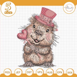 May include: An embroidered design of a smiling groundhog wearing a pink top hat and holding a pink heart-shaped lollipop. The design is in shades of brown, pink, and white. The image includes the text "5 size" and various file format icons.