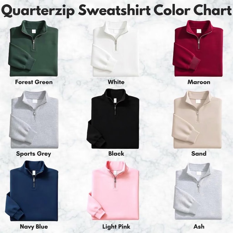 May include: A Quarterzip Sweatshirt Color Chart displaying nine long-sleeve sweatshirts with zippers in forest green, white, maroon, sports grey, black, sand, navy blue, light pink, and ash. Each sweatshirt is labeled with its respective color name.