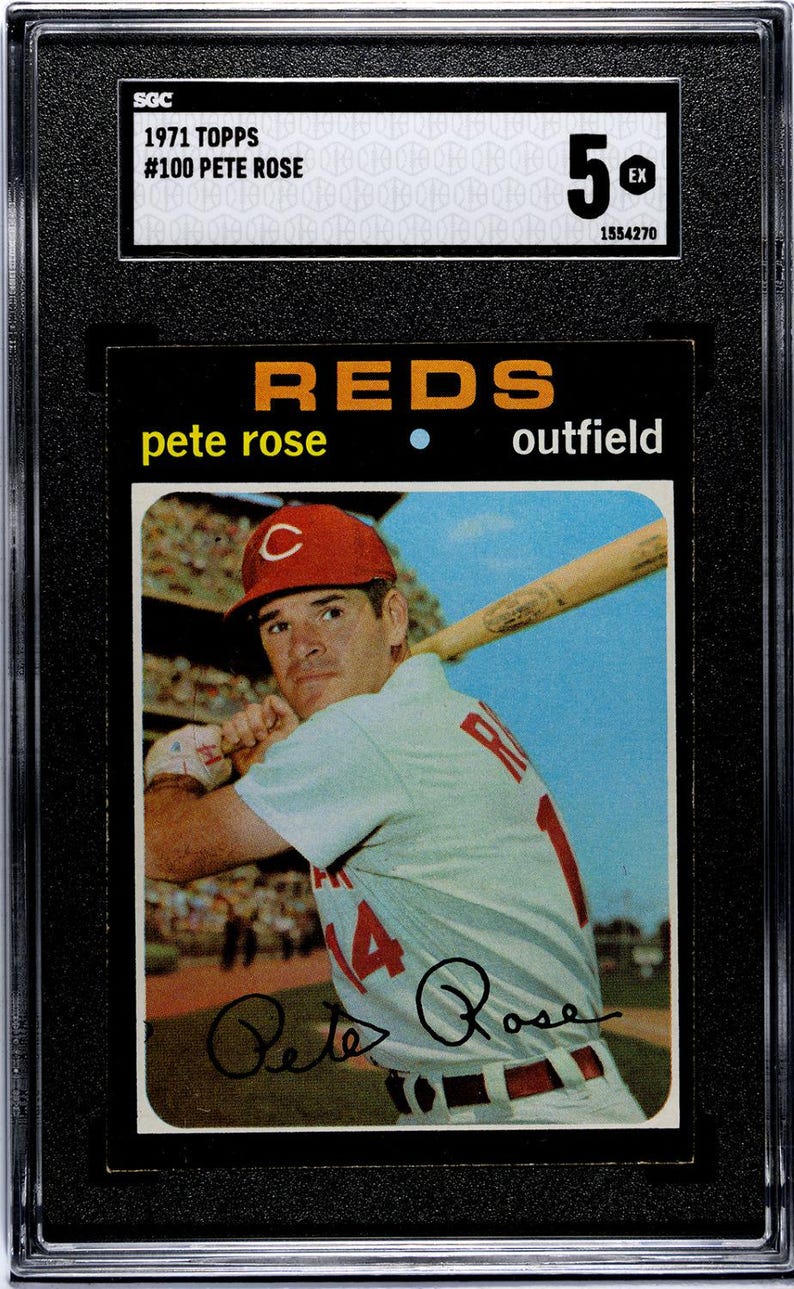 May include: A baseball card featuring Pete Rose in a Cincinnati Reds uniform, holding a bat. The card is graded EX 5 by SGC. The card reads "1971 TOPPS #100 PETE ROSE" and "REDS outfield". The card is encased in a black holder.