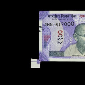 Fehler Indien 100 Rupien extra Papierschneidefehler.