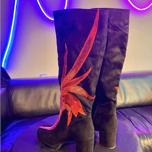 Black faux suede Fireball Flame Boots with red and gold sequin flames designed and created by Niniannebast Designs for Hamilton Fashion Week 2026. Back side view.