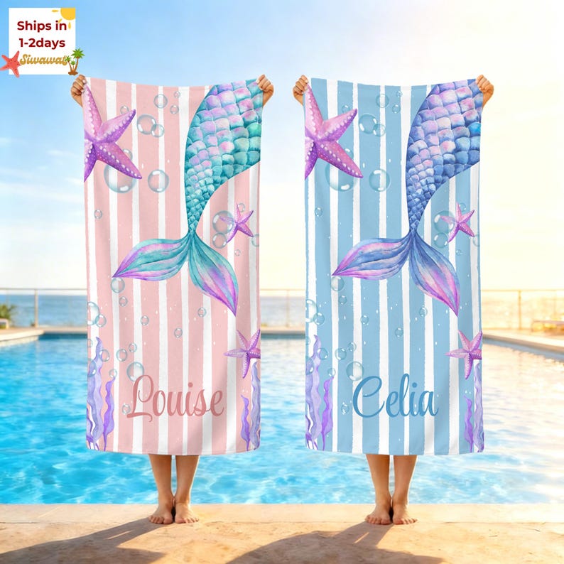 May include: Two beach towels with mermaid tail designs. One towel is pink with white stripes, the other is blue with white stripes. Both have starfish, bubbles, and the names "Louise" and "Celia".