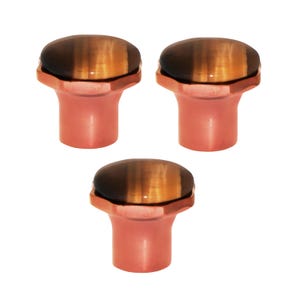 May include: Three copper-coloured cabinet knobs with a tiger's eye stone top. The knobs have a cylindrical base and a faceted, rounded top. The tiger's eye stone has brown and gold tones.