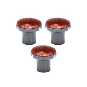 May include: Three cabinet knobs with a brushed metal base and a reddish-brown, speckled top. The knobs are evenly spaced against a white background, showcasing their design and texture. These knobs are suitable for furniture or cabinet upgrades.