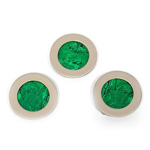 May include: Three circular cufflinks featuring a silver-toned frame and a vivid green, marbled inlay. The cufflinks are presented on a white backdrop, highlighting their design and colour.