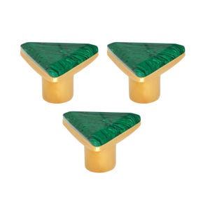 May include: Three decorative cabinet knobs. Each knob features a triangular, green malachite top with gold-coloured trim and a cylindrical gold-coloured base. The knobs are arranged against a white background.