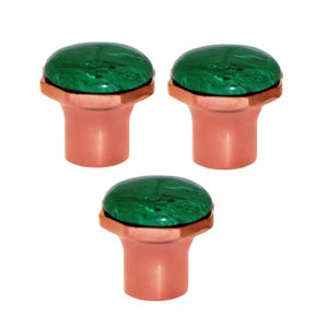 May include: Three cabinet knobs with a copper-coloured base and a green, marbled stone top. The knobs have a rounded, mushroom-like shape. The green stone has a swirling pattern.