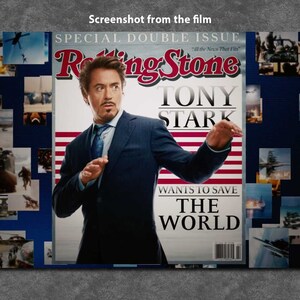 May include: A magazine cover featuring a man in a suit with the title "Tony Stark" and the text "Wants to Save The World". The magazine cover is a parody of Rolling Stone magazine.