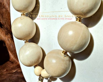 Jumbo Bead Wood, bone, and brass necklace