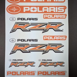 Foglio di adesivi e decalcomanie per grafica fuoristrada laminata Polaris RZR Razor Orange