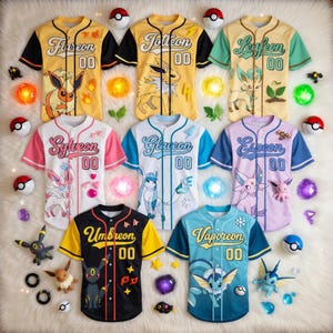 May include: Baseball jerseys featuring various Pokémon characters, including Flareon, Jolteon, Sylveon, Glaceon, Umbreon, Leafeon, Espeon, and Vaporeon. Each jersey has a unique color scheme and character design, with the character's name and the number "00" on the front.