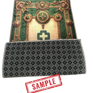 May include: An ornate green and gold prayer rug with a central design and a patterned border. The rug features a detailed, decorative design with a cross symbol. The word "SAMPLE" is stamped in red.