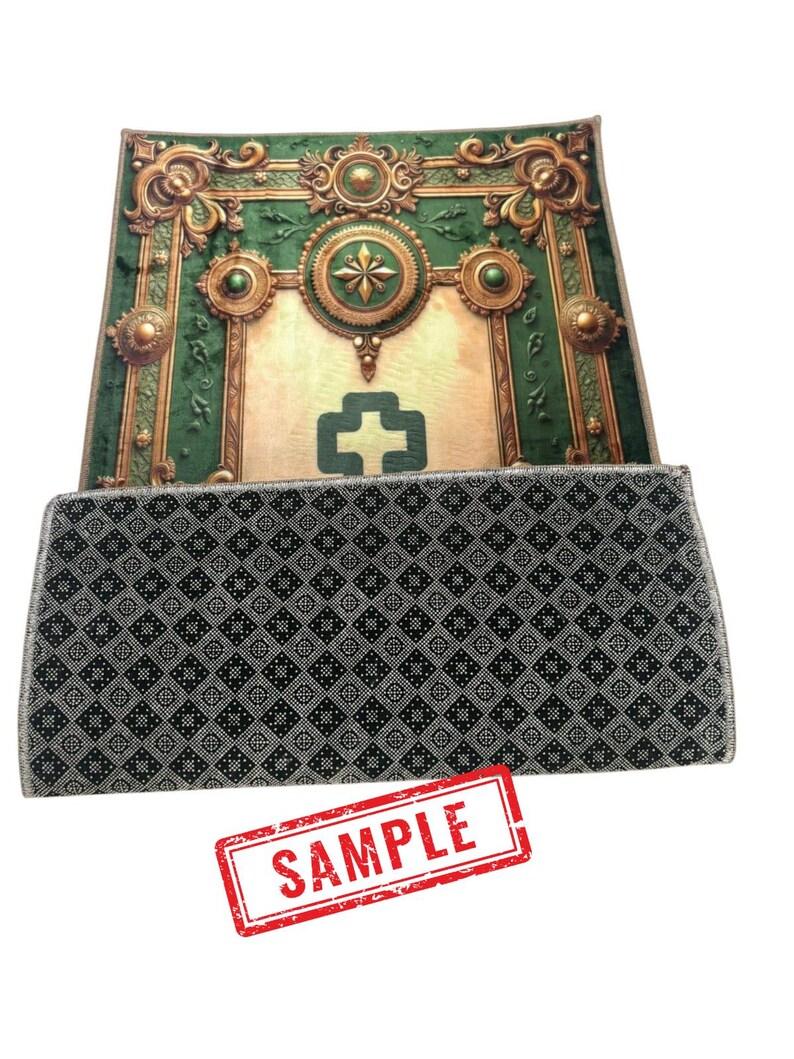 May include: An ornate green and gold prayer rug with a central design and a patterned border. The rug features a detailed, decorative design with a cross symbol. The word "SAMPLE" is stamped in red.