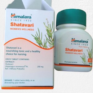 May include: A white bottle and box of Himalaya Shatavari tablets. The box features the text "Shatavari WOMEN'S WELLNESS" and "Since 1930". The bottle has a green cap and contains 60 tablets. The box states that Shatavari is a nourishing tonic.