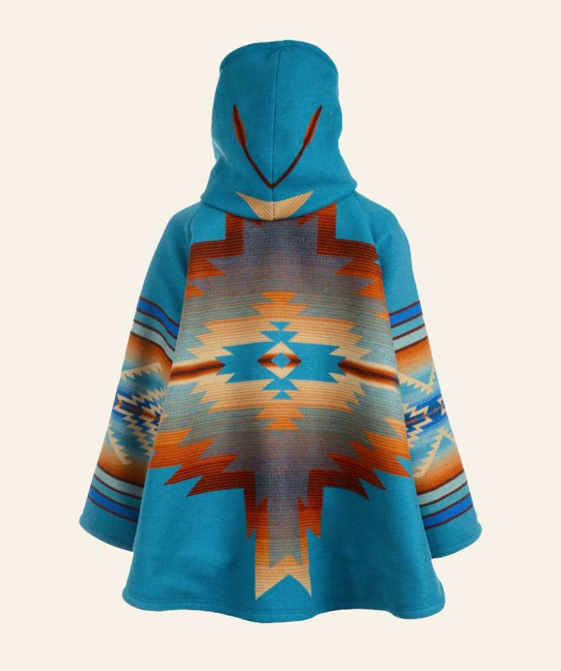 May include: A turquoise hooded poncho with a Southwestern-inspired geometric pattern in shades of orange, brown, and blue. The poncho features a hood and wide sleeves, offering a comfortable and stylish outerwear option.