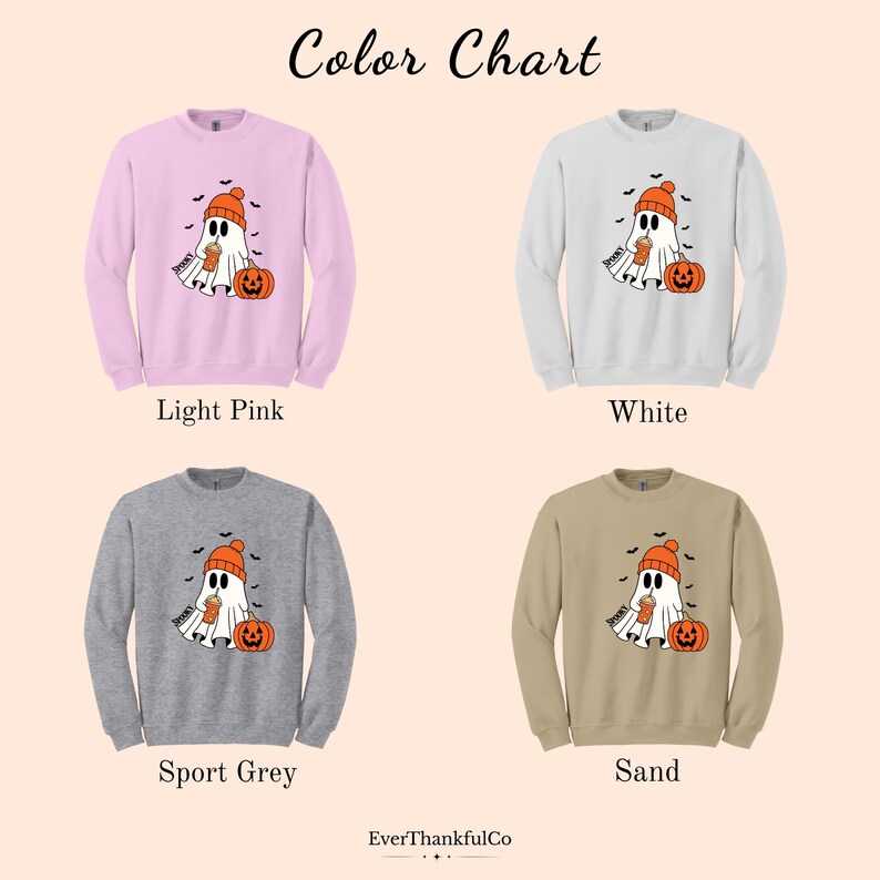 May include: A color chart displays four crewneck sweatshirts in light pink, white, sport grey, and sand. Each sweatshirt features a ghost graphic wearing a beanie and holding a drink, with a pumpkin. The text "Color Chart" is at the top.