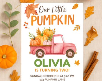 May include: A birthday invitation with the text "Our Little Pumpkin" and "Olivia is turning two!" features a pink truck carrying pumpkins. The invitation includes date, time, and location details, with fall leaves and pumpkins as decorative elements.