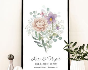 May include: A framed floral print featuring a watercolor bouquet with a large peach peony, purple violets, and greenery. The print includes the names "Kara & Napat" and the date "EST. MARCH 12 2026". The bottom of the print lists "NOVEMBER.PEONY / FEBRUARY.VIOLET".