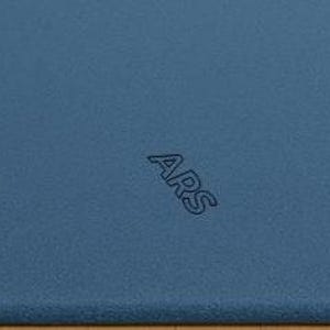 May include: A textured, blue surface with the letters "ARS" embossed in three places. The surface has a matte finish and appears to be made of a durable material. The letters are in a sans-serif font.