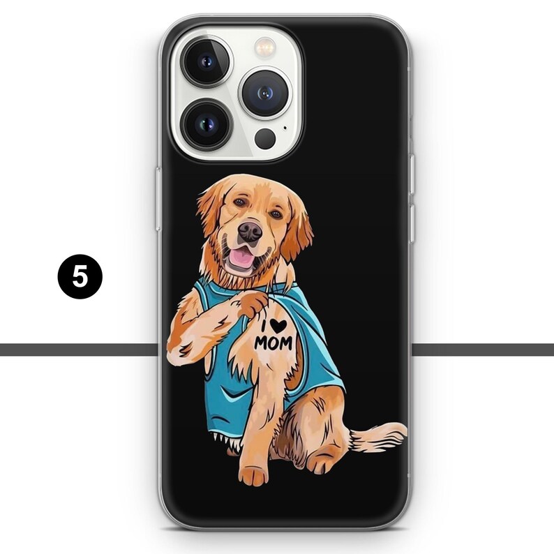 May include: Black phone case featuring a cartoon Golden Retriever wearing a blue shirt with "I ❤️ MOM" tattoo. The dog is smiling with its tongue out. The case has a clear border and a black background.
