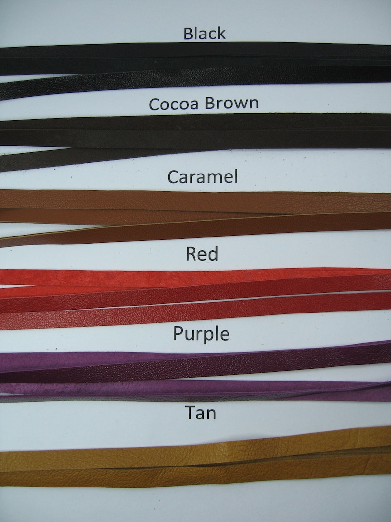 May include: Close-up of leather strips in various colors: black, cocoa brown, caramel, red, purple, and tan. Each strip is labeled with its color name. The strips are thin and appear to be made of genuine leather.