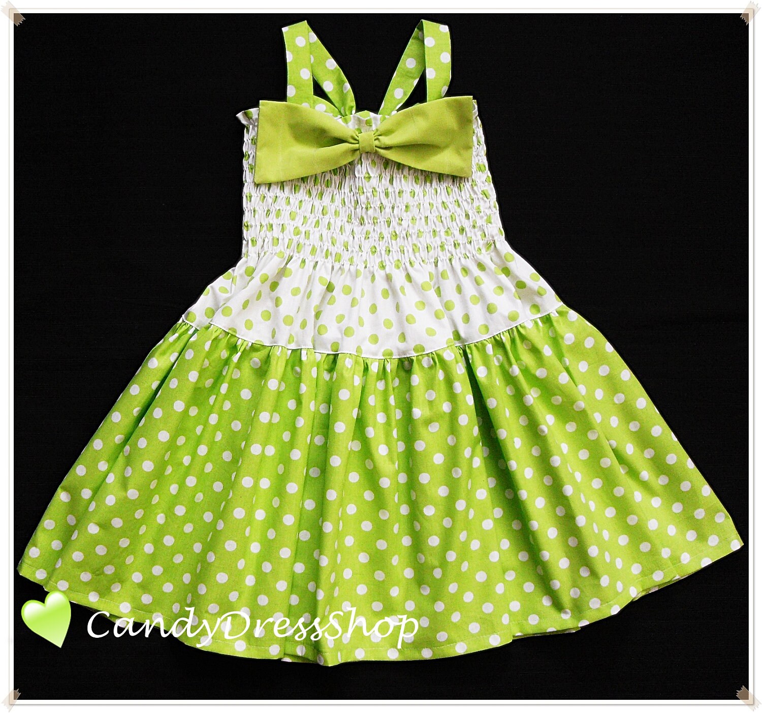 green and white spotty dress