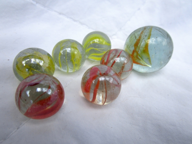 Set of 7 Onion Skin Swirl Marbles in Green and Orange Patterned Set of 7 Onion Skin Swirl Marbles in Green and Orange Patterned