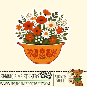 May include: A sticker featuring a vibrant floral arrangement in an orange bowl. The flowers include red poppies, daisies, and other blooms with green foliage. The bowl has a decorative bird and flower design. The sticker is from Sprinkle Me Stickers.