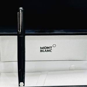 Preowned MONTBLANC M Black  Design By Marc Newson Magnet Cap-System Rollerball Pen Blue INK With Box
