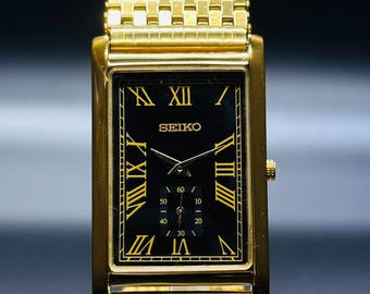 Vintage Seiko Quartz Dress Watch: Black & Gold Dial, New Leather Band