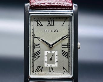 Vintage Seiko Quartz Watch: Slim Silver Dial, New Leather Band