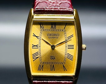 Klasyczny zegarek kwarcowy Seiko Rectangular: złota tarcza, nowy skórzany pasek