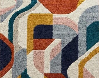 Handtuftad abstrakt geometrisk matta i ull, modern färgglad yta