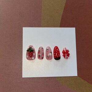 Custom made strawberry inspired press on nails
