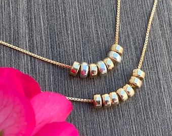 14kt Gold Filled Necklace: Seven Rings of Luck, Minimalist Style