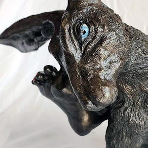 Redefining Luck" Bronze Sculpture: A Question of Belief. Jack rabbit, hare